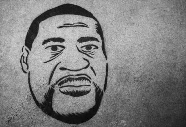 George Floyd art on a Chicago Avenue sidewalk.