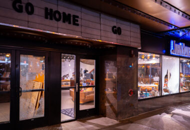 Gunfire breaks windows at the Uptown Theater on June 21, 2020.
