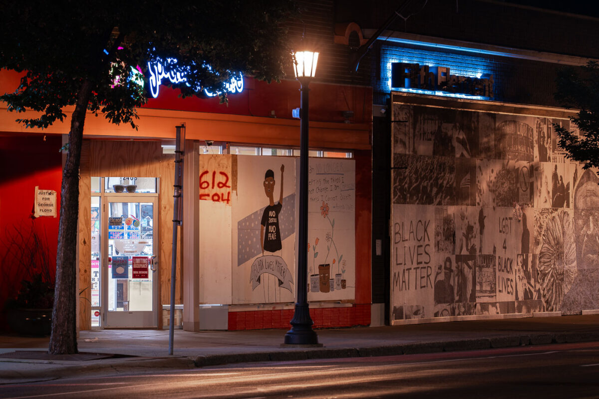 Artwork covering boards on retail store on Hennepin Ave in Minneapolis. The boards were put up unrest in Minneapolis following the May 25th, 2020 death of George Floyd.