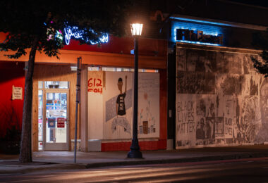 Artwork covering boards on retail store on Hennepin Ave in Minneapolis. The boards were put up unrest in Minneapolis following the May 25th, 2020 death of George Floyd.