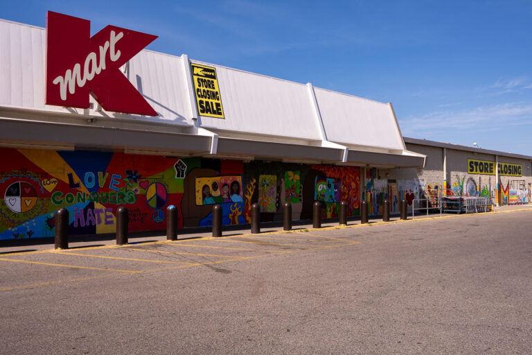 K-Mart with boards on Lake Street 2 The former K-Mart store was turned into a United States Post Office after 2 nearby stations burned during unrest. The building with boards shown here on June 14, 2020.
