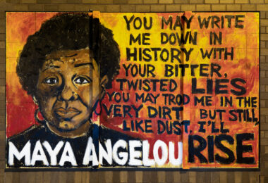 A mural on the side of Calhoun Square mall with a quote by Maya Angelou:

“You may write me down in history with your bitter twisted lies, you may trod me in the very dirt, but still like dust, I’ll rise”