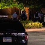 The Minneapolis Police enter the Sheraton Hotel in Midtown Minneapolis following calls regarding a fire inside.