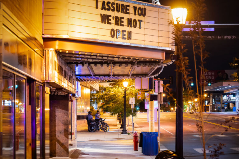 Minneapolis police on bikes and the Uptown Theatre 4 Minneapolis Police on bikes patrol outside the Uptown Theater while hot rudders gather in the area. The streets were closed after nights of street closures.