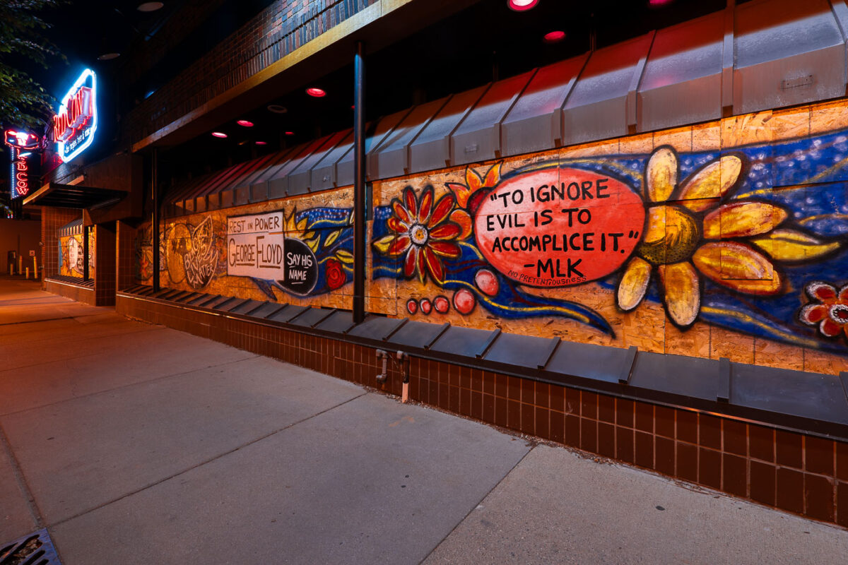 Painted boards at Red Cow Restaurant in Uptown Minneapolis. 

To ignore evil is to accomplice it  MLK