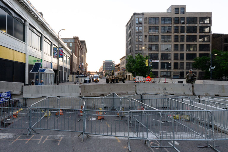 Barricades and National Guard outside the 1st Precinct 2 National Guard and barricades in front of the Minneapolis Police 1st Precinct in Downtown Minneapolis during unrest following the May 25th, 2020 death of George Floyd.
