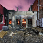 The back of the remains of a chiropractor office on E. Lake Street. Located across the street from the burned out 3rd precinct police station. The building burned after unrest in Minneapolis following the May 25th, 2020 death of George Floyd.