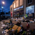 Offerings left on Chicago Ave a week after George Floyd was killed.