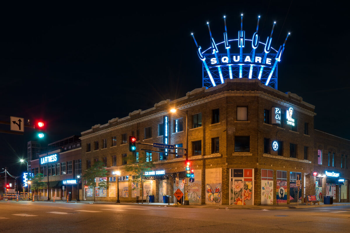 Calhoun Square (now called Seven Points) at Lake and Hennepin in Uptown Minneapolis with painted boards on the windows. The boards were installed after unrest in Minneapolis following the May 25th, 2020 death of George Floyd.