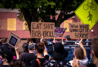 Protesters rally outside the Minneapolis Police Union Headquarters asking for Union President Bob Kroll to resign.