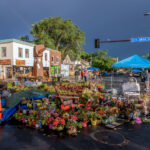 George Floyd memorial outside of Cup Foods on Chicago Ave/38th Street in South Minneapolis. Rainbow slightly visible as a storm moves through.