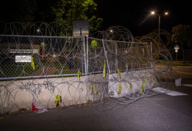 The Minneapolis Police 4th Precinct located in North Minneapolis. Behind razor wire and concrete barricades.
