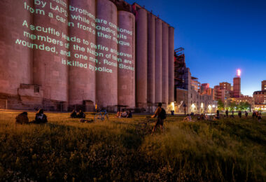 Projection on the Gold Medal Flour concrete elevators near downtown Minneapolis.

“Revolution Will Be Televised”