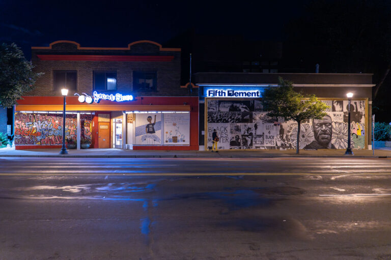 Fifth Element, Spectacle Shoppe With Boards 1 Spectacle Shoppe and Fifth Element on Hennepin Avenue with boards on it following the murder of George Floyd.