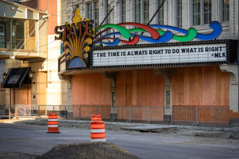 State Theatre boarded up in Downtown Minneapolis 2 State Theatre marquee in downtown Minneapolis with an MLK quote.