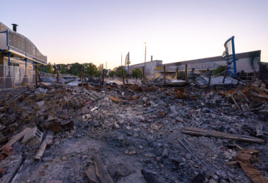 The rubble of a strip mall on Lake Street that burned during riots that followed the death of George Floyd in May 2020.