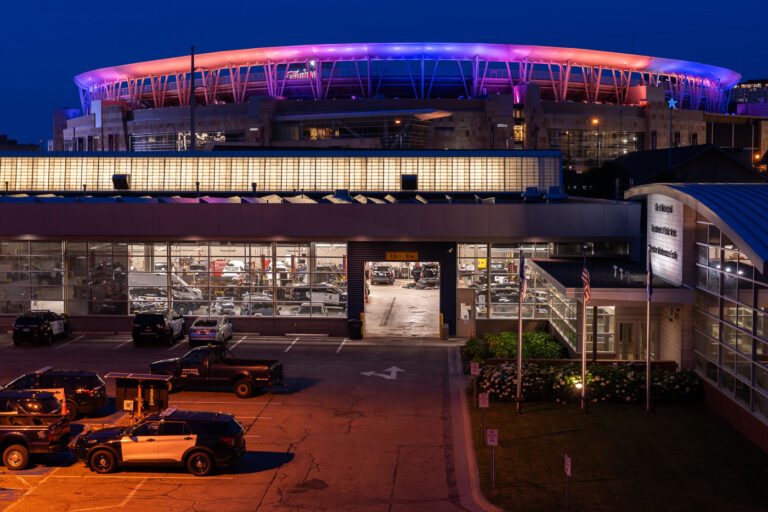 Target Field and city garage 3 Minneapolis Police Squad Cars in for repair at the city maintenance facility in front of Target Field in Downtown Minneapolis.