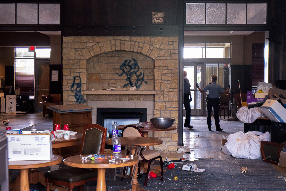 Inside the Midtown Sheraton Hotel while being raided by the Minneapolis Police Department. The hotel which was abandoned by its owner was cleared out and boarded up.