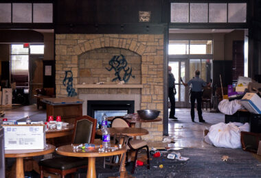 Inside the Midtown Sheraton Hotel while being raided by the Minneapolis Police Department. The hotel which was abandoned by its owner was cleared out and boarded up.