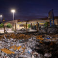 A Dollar General store on East Lake Street in South Minneapolis. In the foreground, what’s left of an HR Block store.