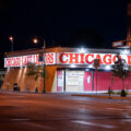 Chicago Lake Liquors on Lake Street with boards over the windows.