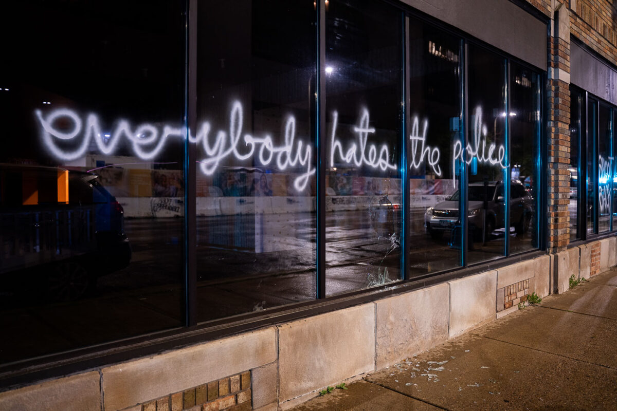 “Everybody hates the police” written on the windows of a downtown Minneapolis building.