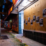 Calvin Horton Memorial at Cadillac Pawn 1 Posters hanging on the boards next to Cadillac Pawn. Memorial for Calvin Horton Jr, who was shot and killed on May 27th. He was shot and killed during the unrest in Minneapolis over the May 25th death of George Floyd.