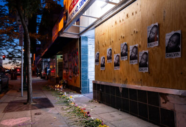 Posters hanging on the boards next to Cadillac Pawn. Memorial for Calvin Horton Jr, who was shot and killed on May 27th. He was shot and killed during the unrest in Minneapolis over the May 25th death of George Floyd.