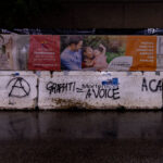"Graffiti = A Voice" written on concrete barricades in Downtown Minneapolis.