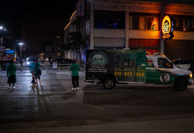 MAD DADs organization with their truck on Hennepin Ave outside the Gay 90s nightclub in downtown Minneapolis.