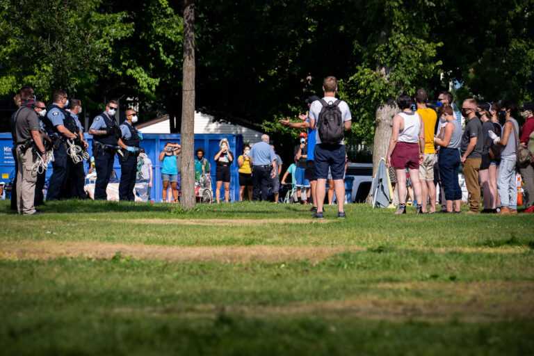 Powderhorn Park and Park Police 2 Minneapolis Park police remove the homeless from their tents at Powderhorn Park in South Minneapolis on July 20th, 2020.