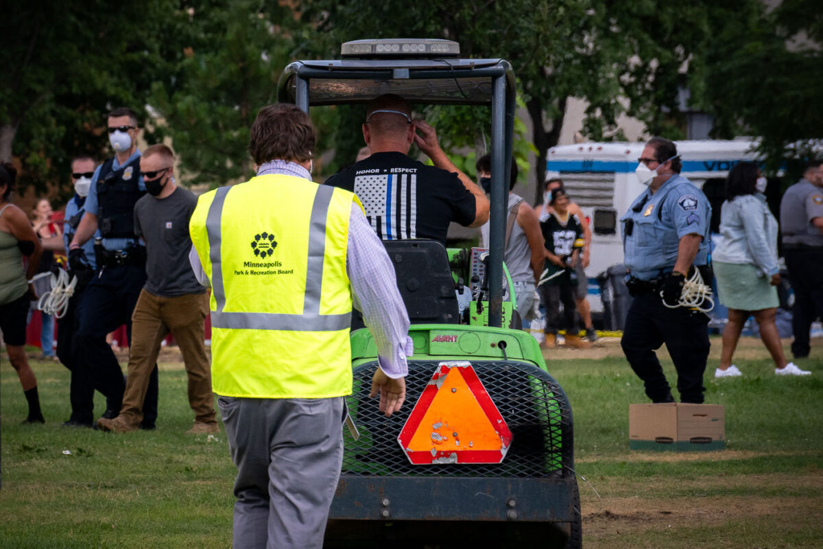 Minneapolis Park police remove the homeless from their tents at Powderhorn Park in South Minneapolis on July 20th, 2020.