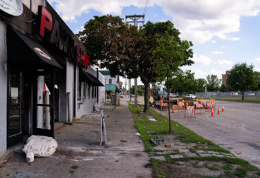 Outside the Max It Pawn shop on Cedar Ave. The building was destroyed in fires following the May 25th, 2020 death of George Floyd.