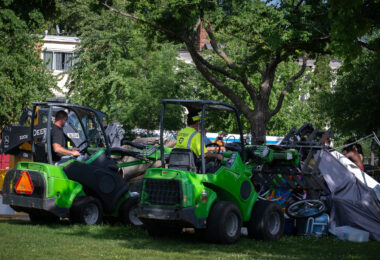 Minneapolis park police bulldoze over tents left behind after clearing an encampment at Powderhorn Park in July 2020.