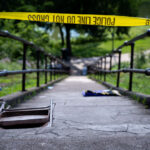 Stairway at Powderhorn Park in South Minneapolis with Police Line Do Not Cross tape.