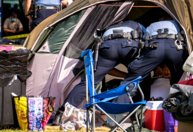 Minneapolis Park police remove the homeless from their tents at Powderhorn Park in South Minneapolis on July 20th, 2020.