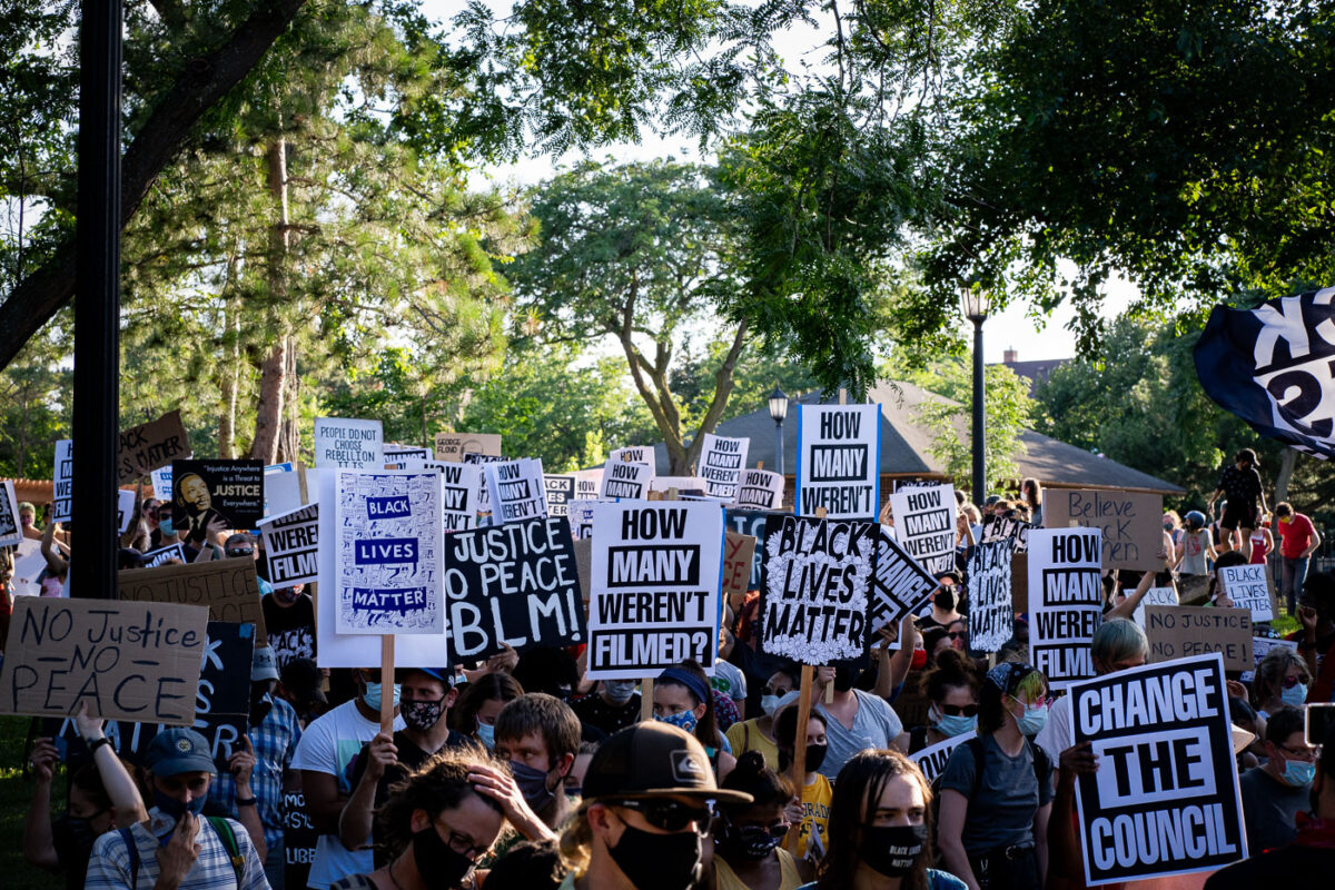 Protesters marching through Uptown Minneapolis on the “How many weren’t filmed?” March.