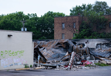 The rubble of the O'Reilly Auto Parts store on Nicollet Avenue. The store was burned after the May 25th, 2020 death of George Floyd.

ACAB, Fuck Jacob Frey, Fuck 12, RIP George and Riots work written on the remaining wall
