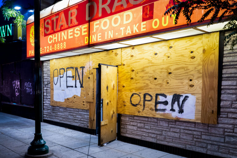 Star Dragon with boards on it - but open 2 Star Dragon Restaurant located at 1540 E Lake St in South Minneapolis. The building was boarded up during the unrest over the May 25th death of George Floyd.