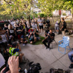 Toussaint Morrison and Nekima Levy Armstrong sitting outside a city council members home taking questions from the crowd. The crowd was part of the march that was led through Uptown Minneapolis on July 24, 2020.