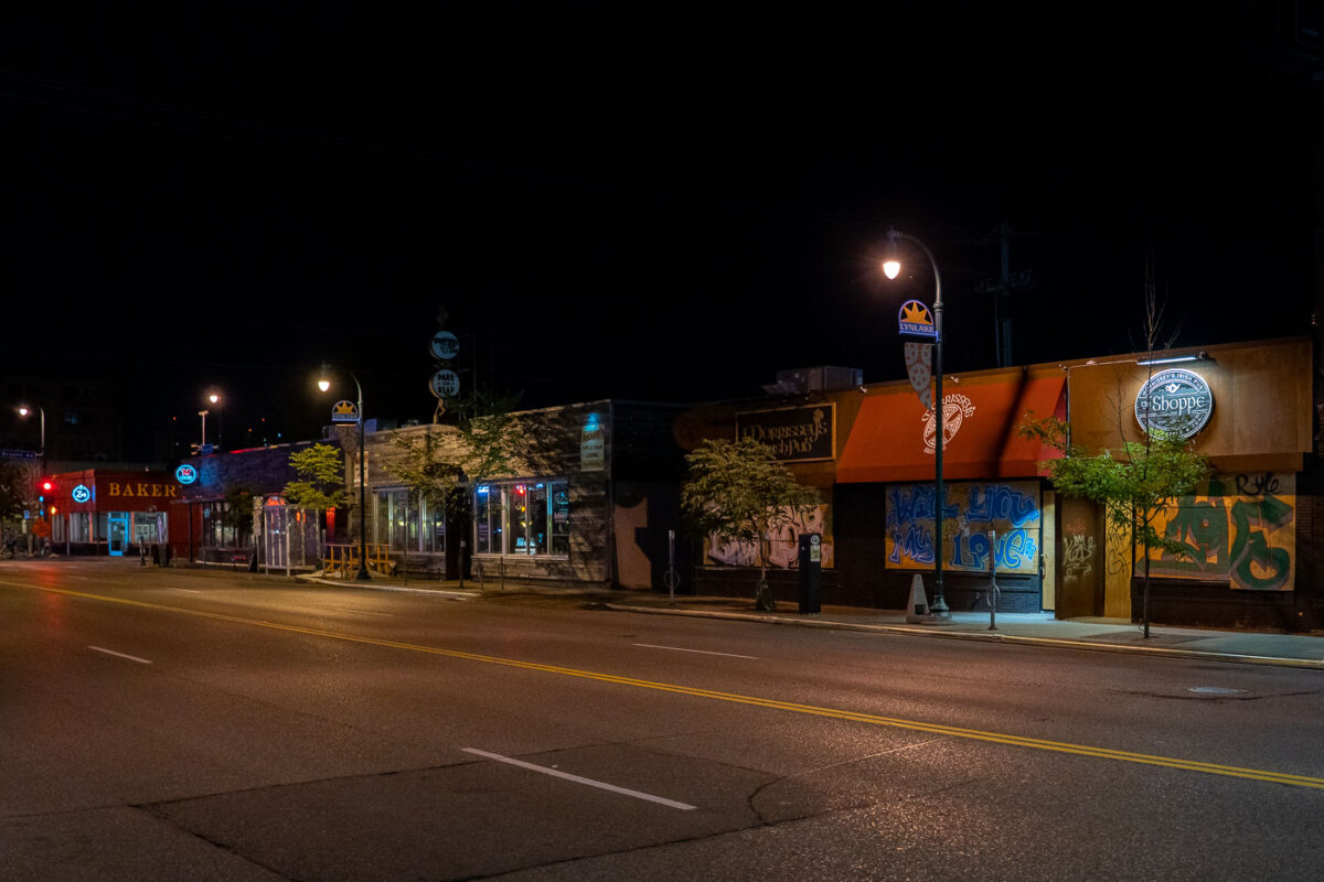 West Lake Street with boards on businesses.