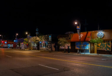 West Lake Street with boards on businesses.