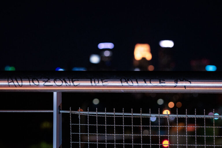 Autozone The Police on Martin Olav Sabo Bridge 2 The Martin Olav Sabo bridge over Haiwatha Ave with "Autozone the police" written on it. AutoZone was the first building burned following the May 25th, 2020 death of George Floyd.