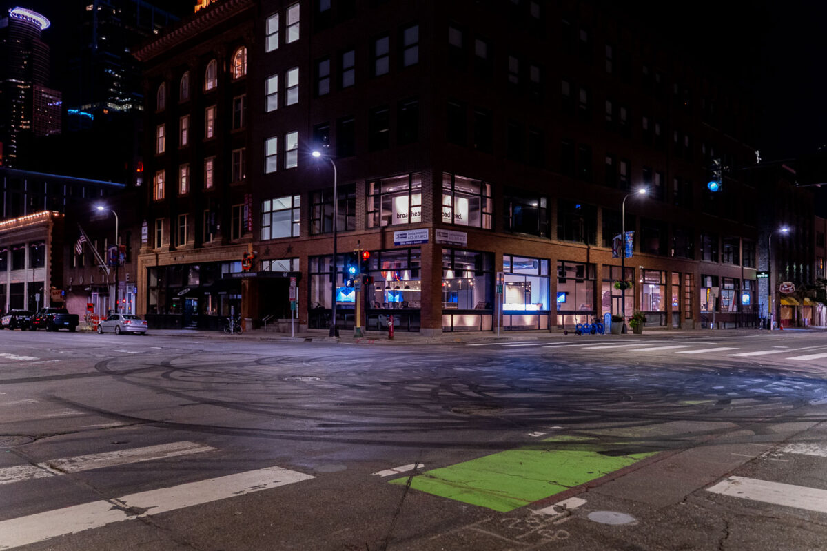 Throughout the summer "Hot Rodders" were gathering at intersections and doing burn outs. One such instance occurred outside the Minneapolis Police 1st Precinct.