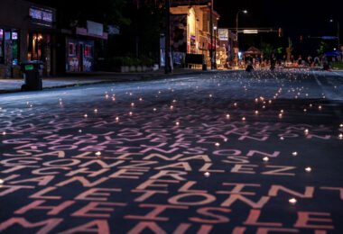 Candles are lit over the names of those killed by police on Chicago Avenue. George Floyd was killed on Chicago Avenue on May 25th, 2020.