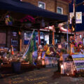 The George Floyd Memorial at George Floyd Square with lit candles.