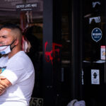 On the day Cup Foods re-opened, owner Mahmoud Abumayyaleh looks out at the memorial in front of his store where George Floyd was killed on May 25th, 2020.