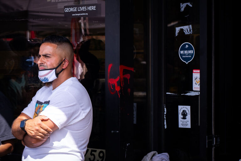 Cup Foods owner Mahmoud Abumayyaleh outside his store 5 On the day Cup Foods re-opened, owner Mahmoud Abumayyaleh looks out at the memorial in front of his store where George Floyd was killed on May 25th, 2020.