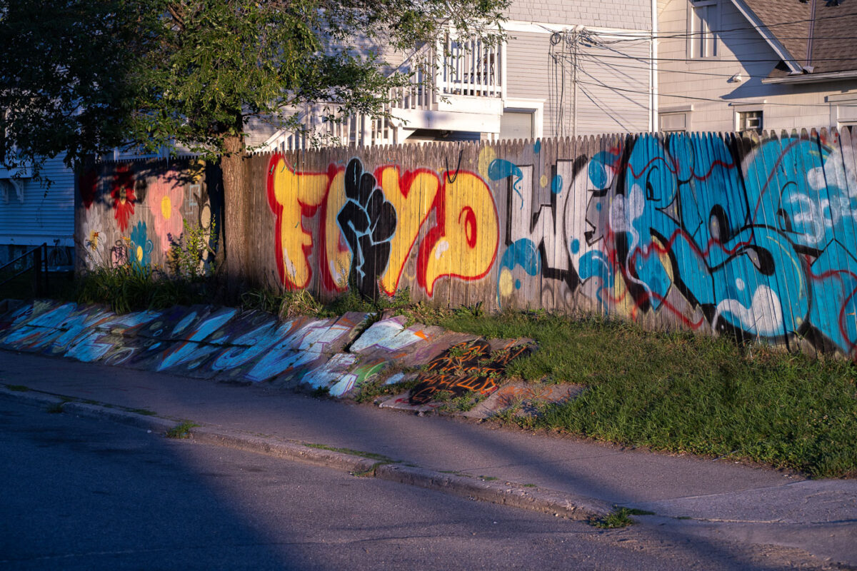 George Floyd graffiti on a fence on 38th Street in George Floyd Square.