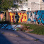 George Floyd graffiti on a fence on 38th Street in George Floyd Square.